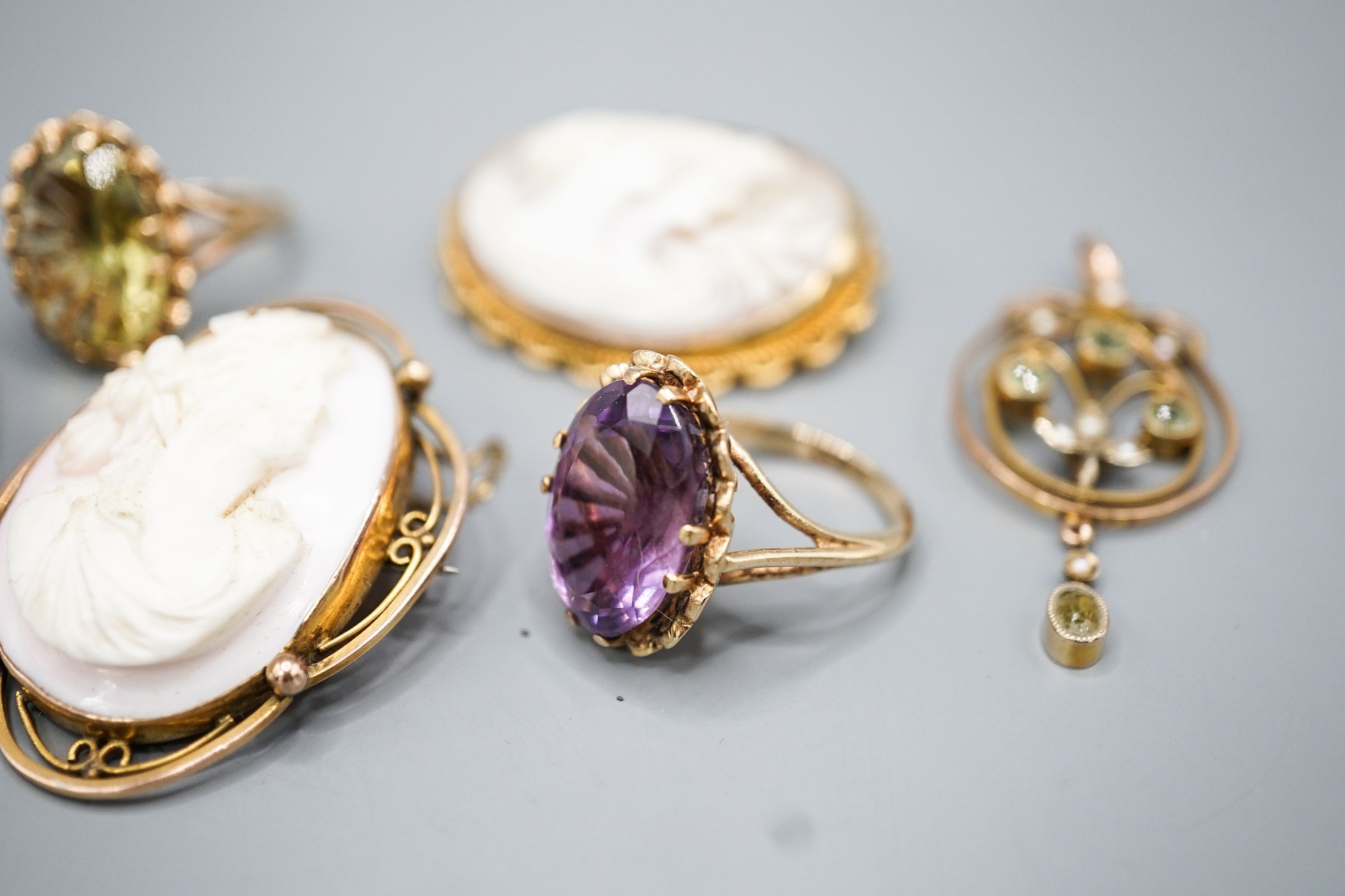 Two modern 9ct gold and gem set rings, a 9ct and gem set pendant, two 9ct mounted cameo shell brooches, gross weight 36.5 grams and a Victorian oval pendant frame, 55mm.